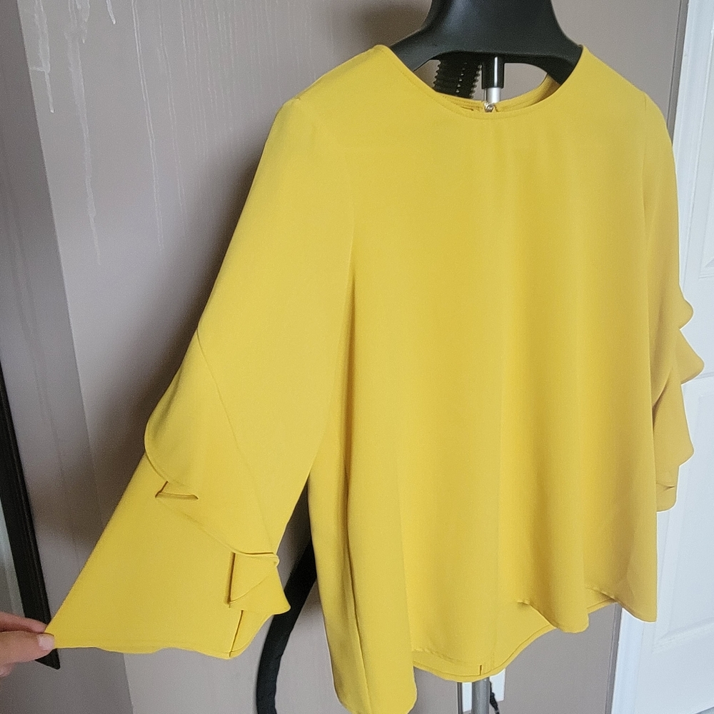 Mustard colored Alfani blouse with ruffled sleeves and zipper back, Size S